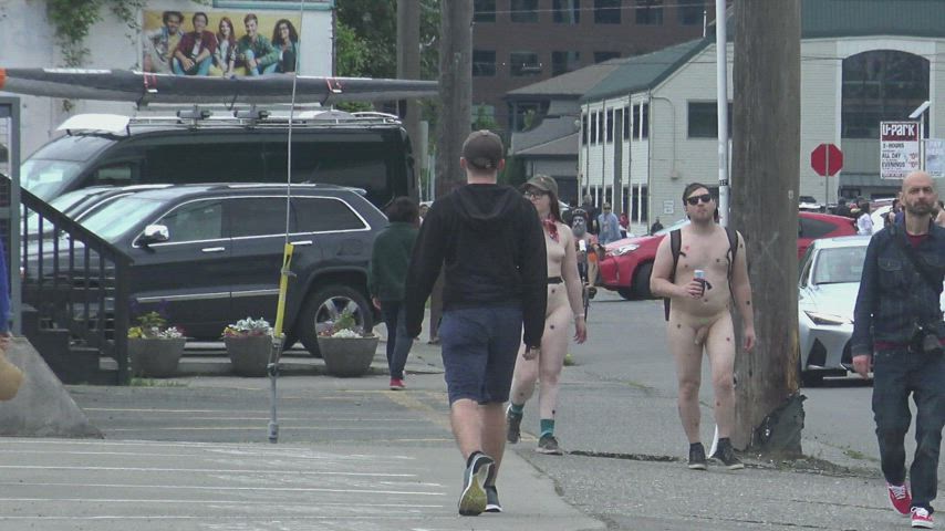 Cute young couple walks around Seattle butt naked