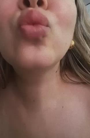 Kiss and showing of her boobs