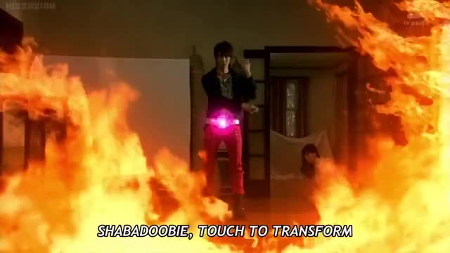Kamen Rider Wizard Water Style transformation puts out a house fire