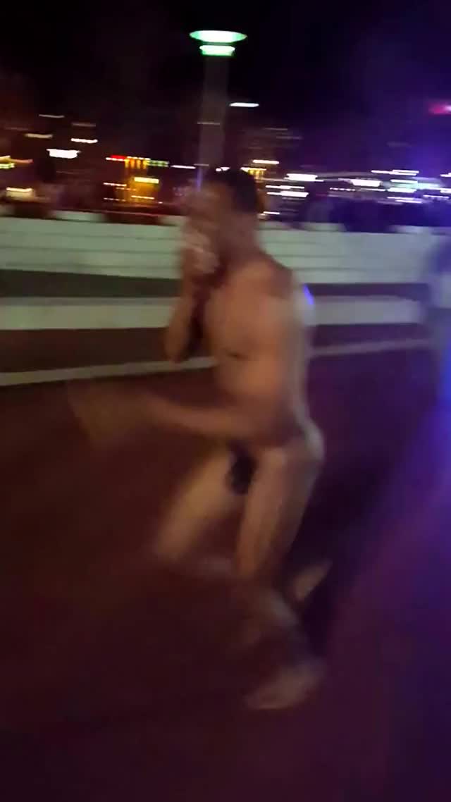 Naked man streaking at light city Baltimore