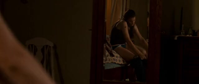 Liv Tyler Putting On Pants - The Strangers - SceneNude.com