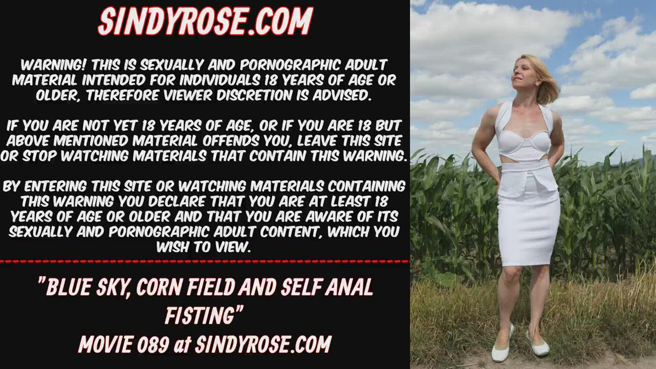 Sindy Rose, prolapse, blue sky, corn field and self anal fisting