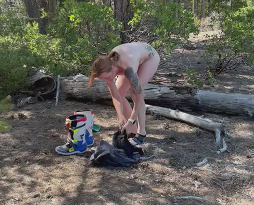 Getting dressed after a little break to get naked on the trail ride.