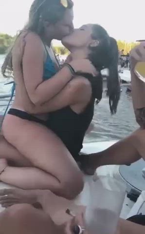 Kissing at a boat party